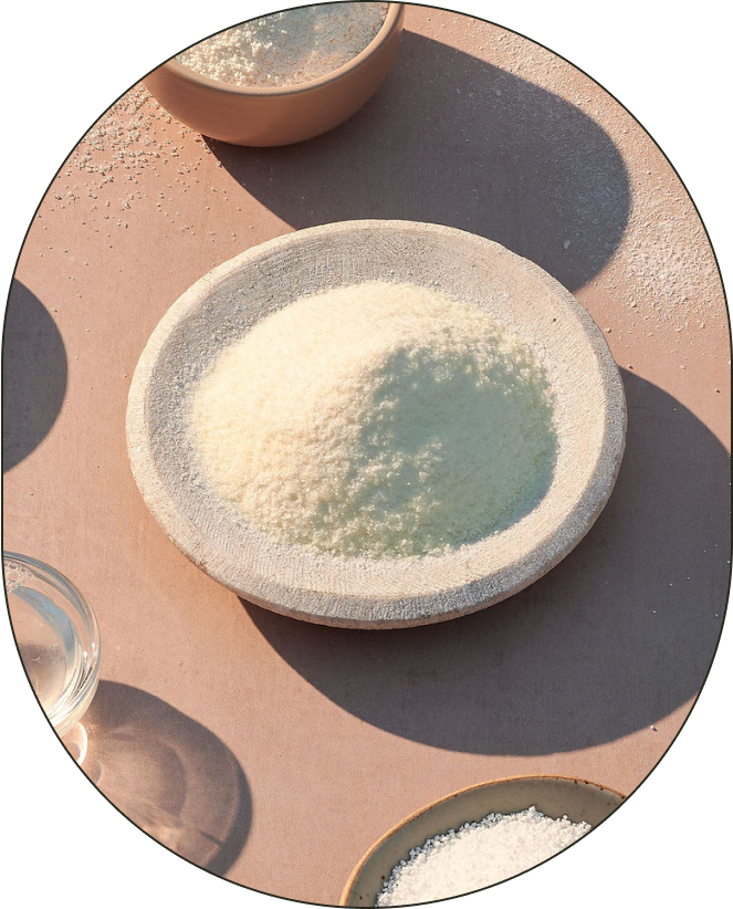 A bowl of Sodium Polyitaconate, positioned against a neutral background with thrown shadows.
