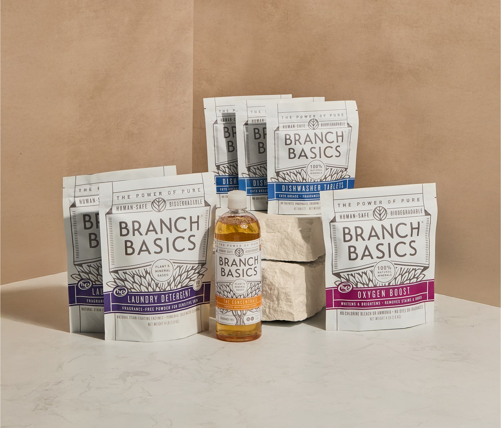 The Full Restock Bundle, featuring a bottle of Branch Basics Concentrate, Oxygen Boost, Laundry Detergent, and Dishwasher Tablets displayed against a neutral background. - View 1
