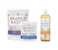 A bottle of Branch Basics Concentrate, a pouch of Dishwasher Tablets, and a pouch of Laundry Detergent are displayed on a white background. - Thumbnail View 2
