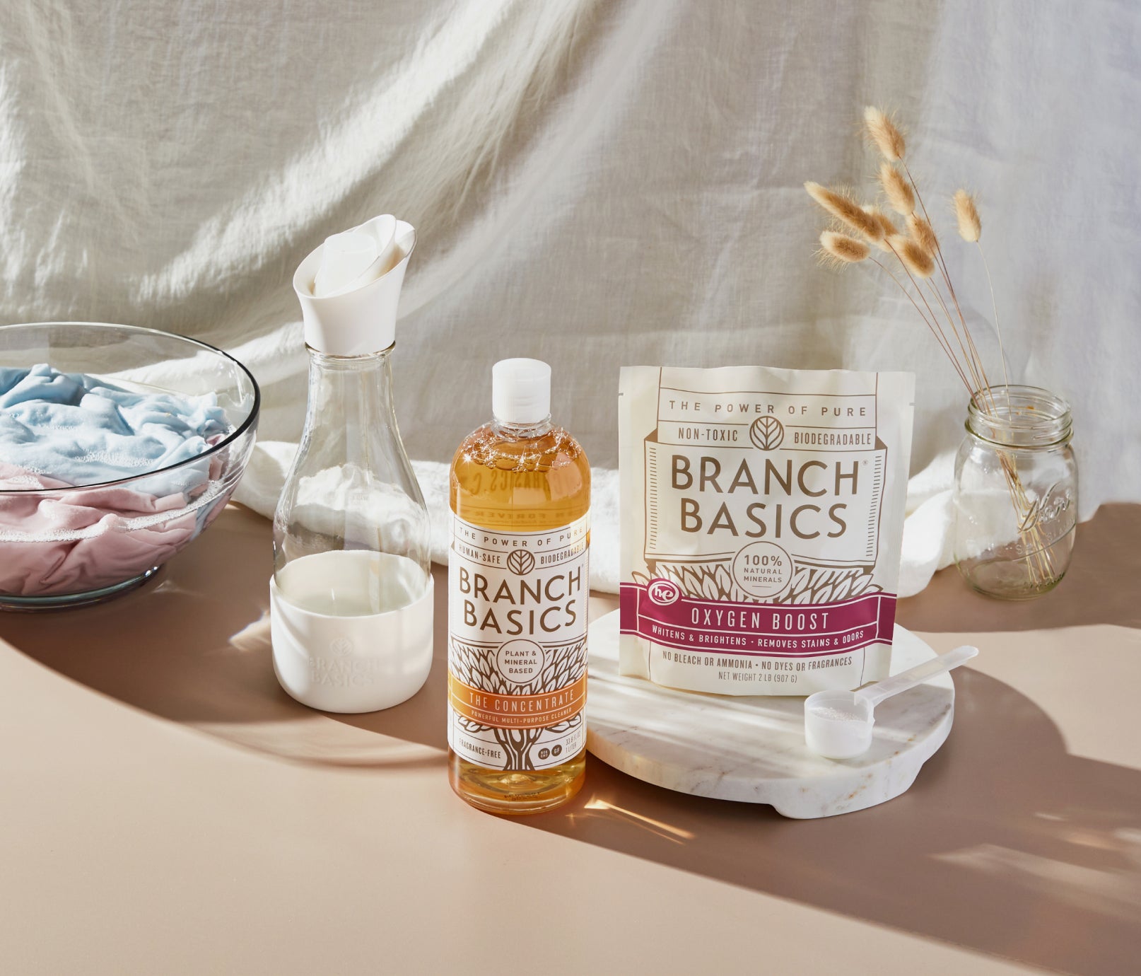 The Laundry Kit featuring a refillable Glass bottle, displayed on a neutral background. - View 1
