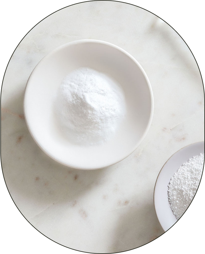 A bowl of Sodium Percarbonate, positioned against a neutral background.
