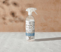 A refillable Plastic Streak-Free bottle, used to dilute and dispense Branch Basics Concentrate with water, displayed on white surface and neutral background. - Thumbnail View 2
