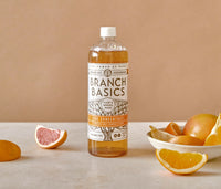 A plastic bottle of Branch Basics Concentrate, displayed against a neutral background. - Thumbnail View 1
